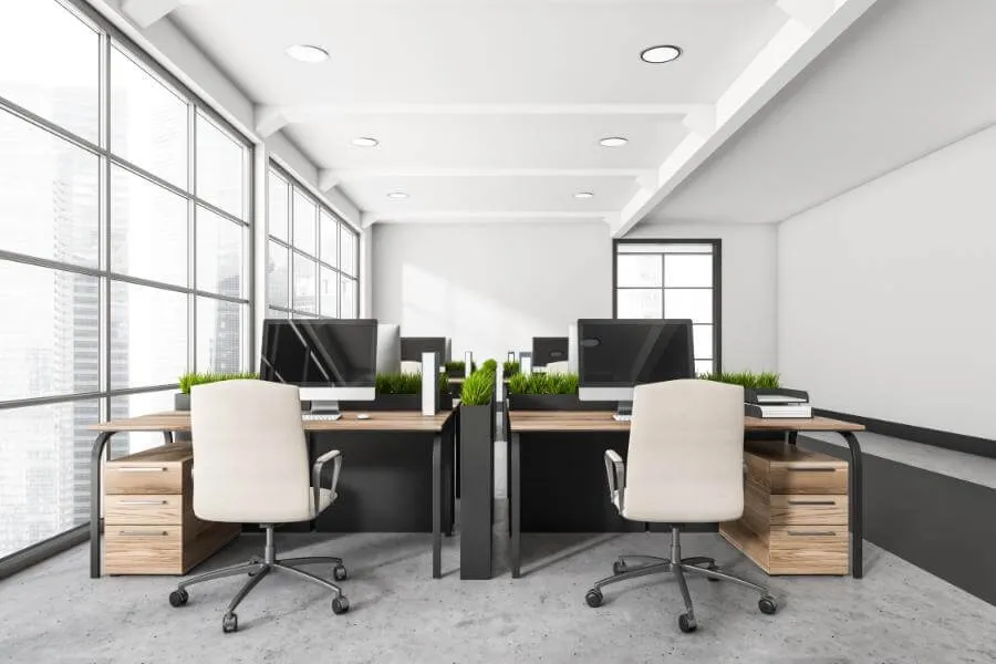 Planten afscheiding kantoor bureau ook gebruikt als werkplekbekabeling oplossing voor opgeruimd kantoor